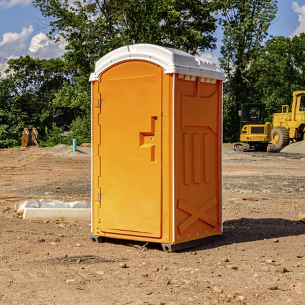 how often are the porta potties cleaned and serviced during a rental period in Iron Belt